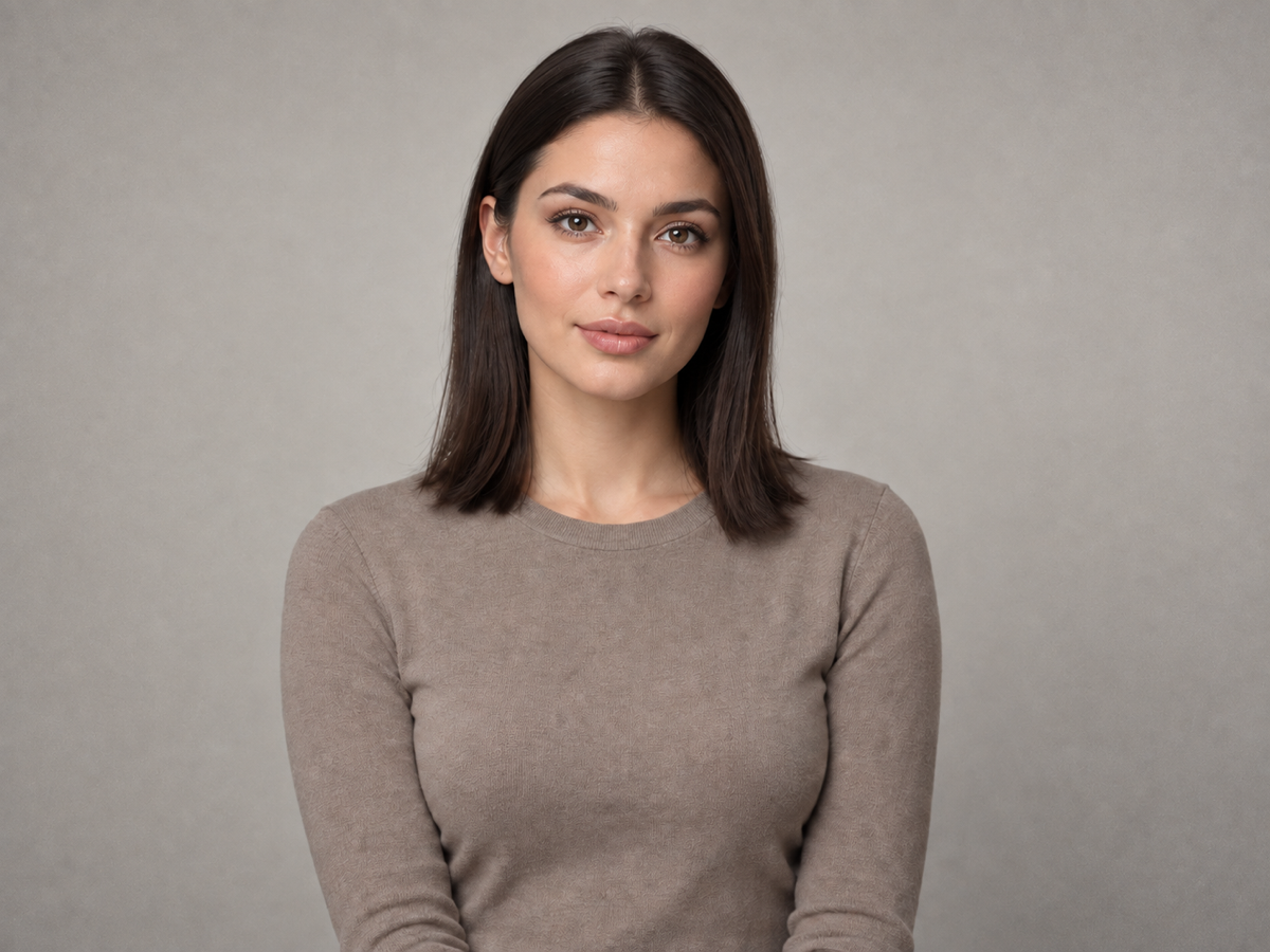 Concept example of the same portrait after a realism pass with natural skin texture, fine noise, and believable light falloff